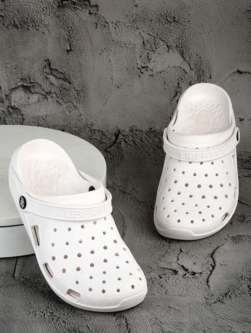 women white solid slip on clogs
