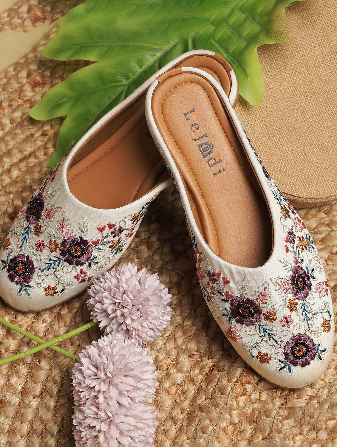 women embellished slip on mojari