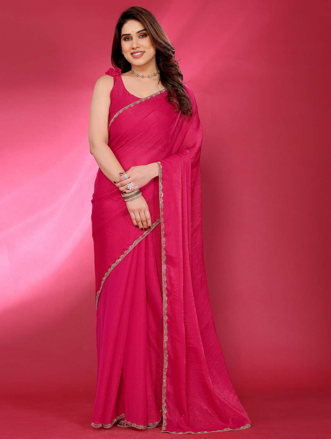 women solid with bordered embellished saree with blouse