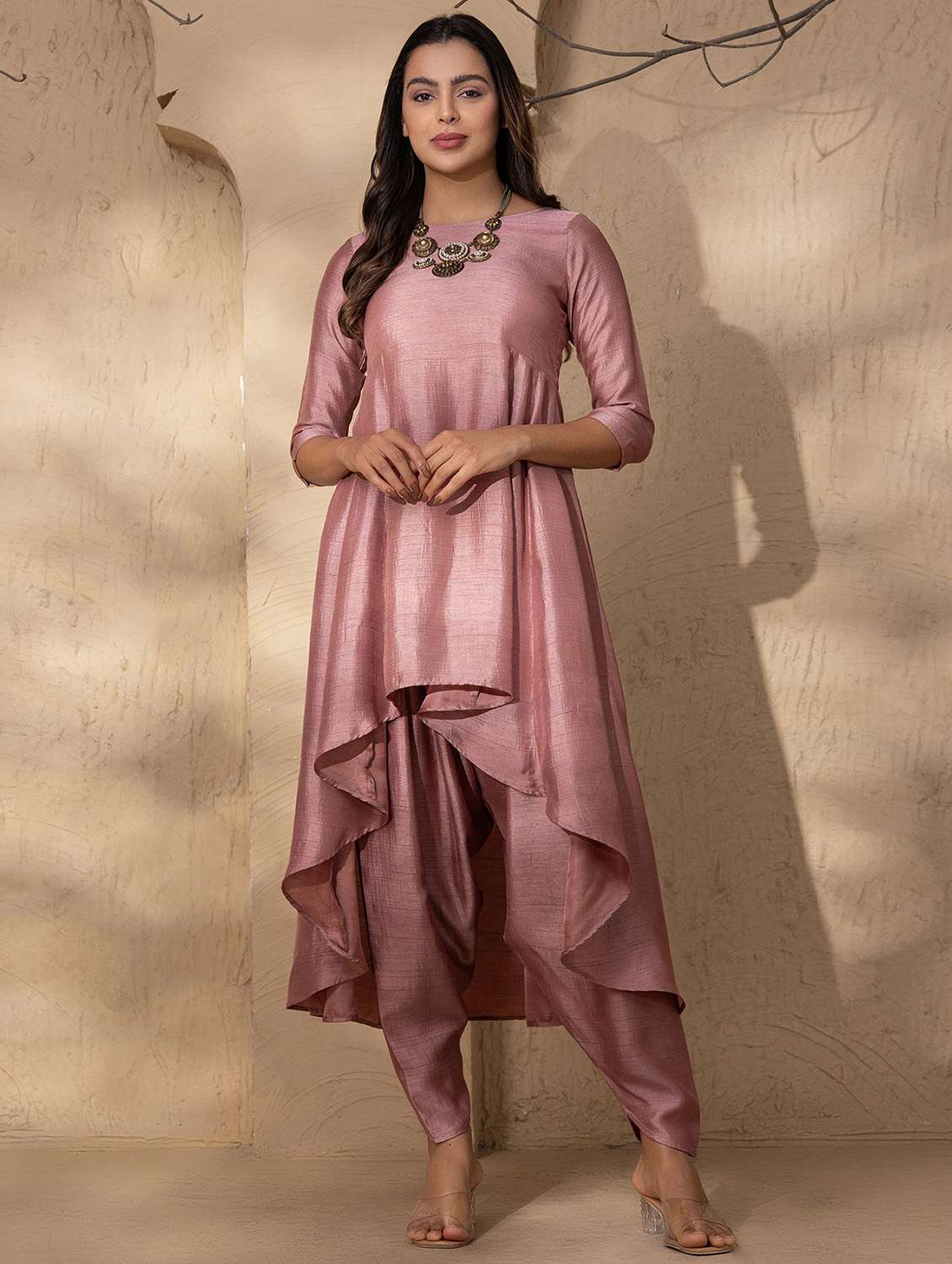 women solid dhoti and high-low kurta set