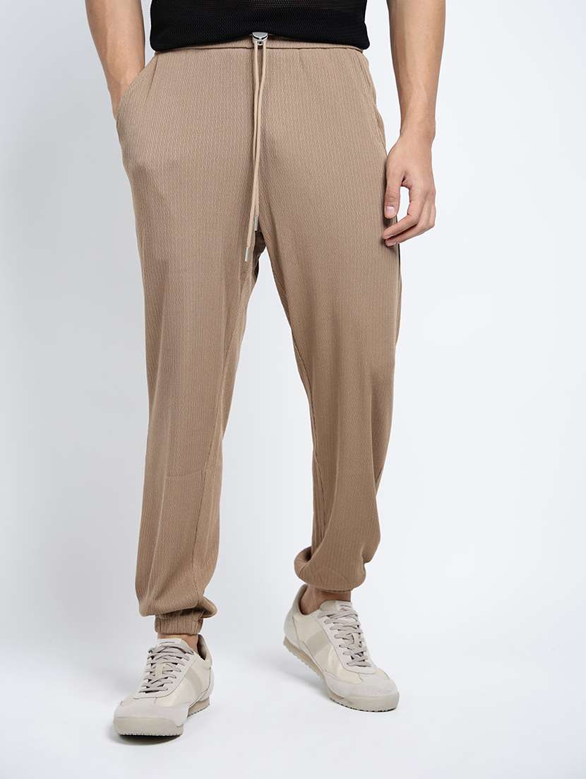 men solid mid rise relaxed fit jogger - 22038040 -  Standard Image - 2