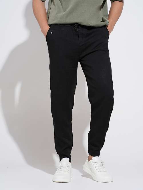 men black solid mid rise regular fit jogger - 22038073 -  Standard Image - 0