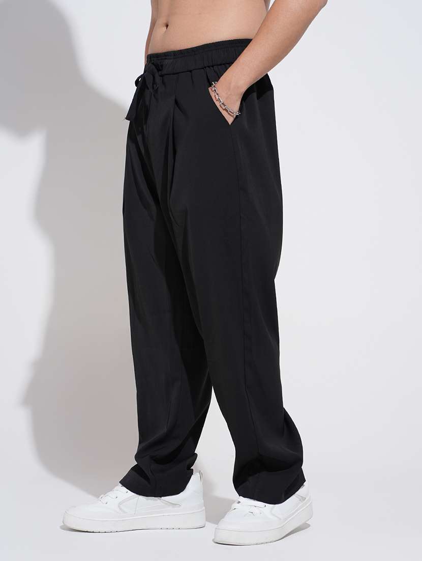men black solid low rise loose fit parachute pant - 22038095 -  Standard Image - 2