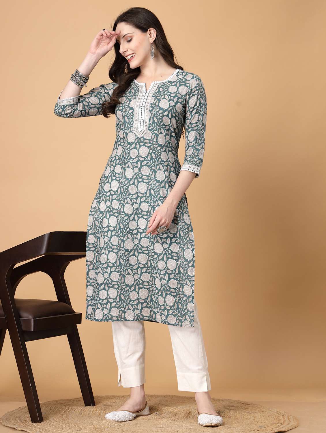 women printed three quarter sleeve straight kurti