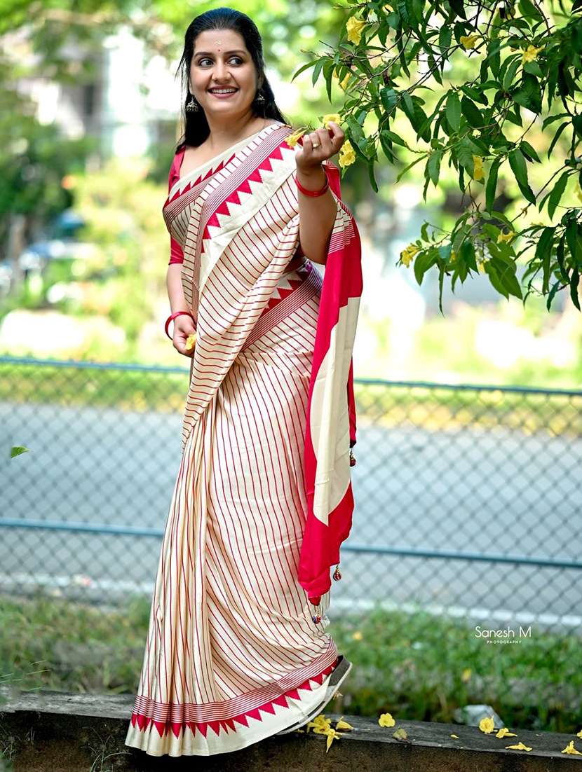 women striped printed saree with blouse