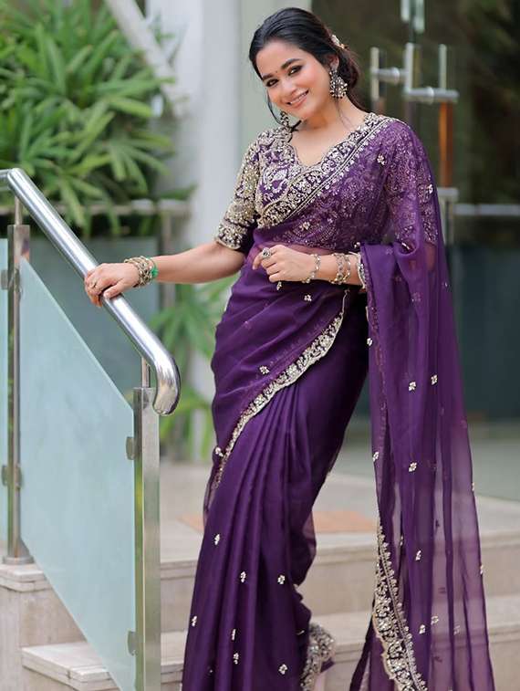 women solid with work embroidered saree with blouse