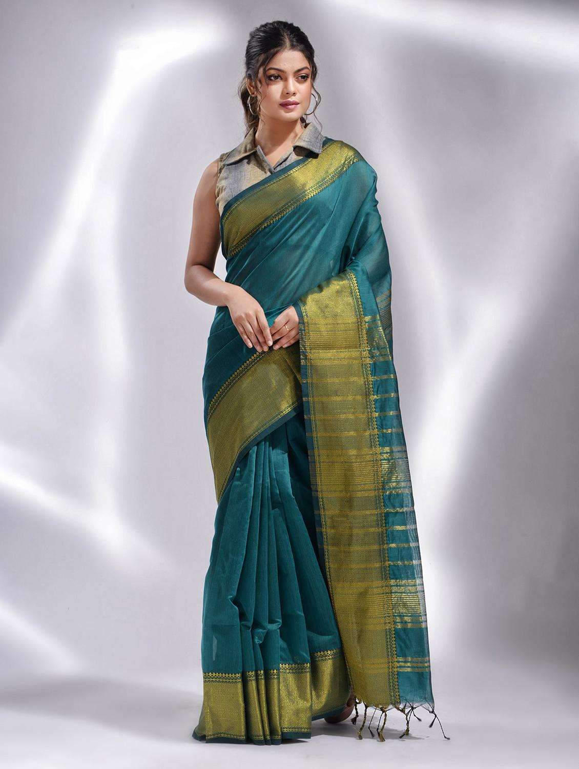 women solid with bordered saree with blouse