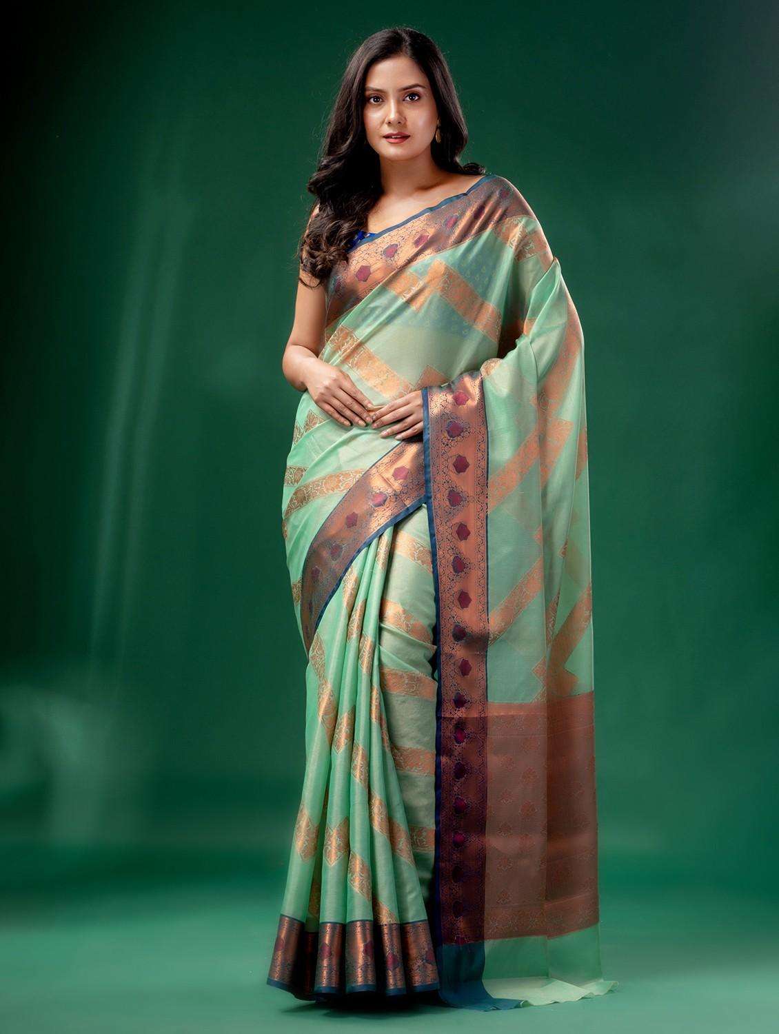 women self design banarasi saree with blouse