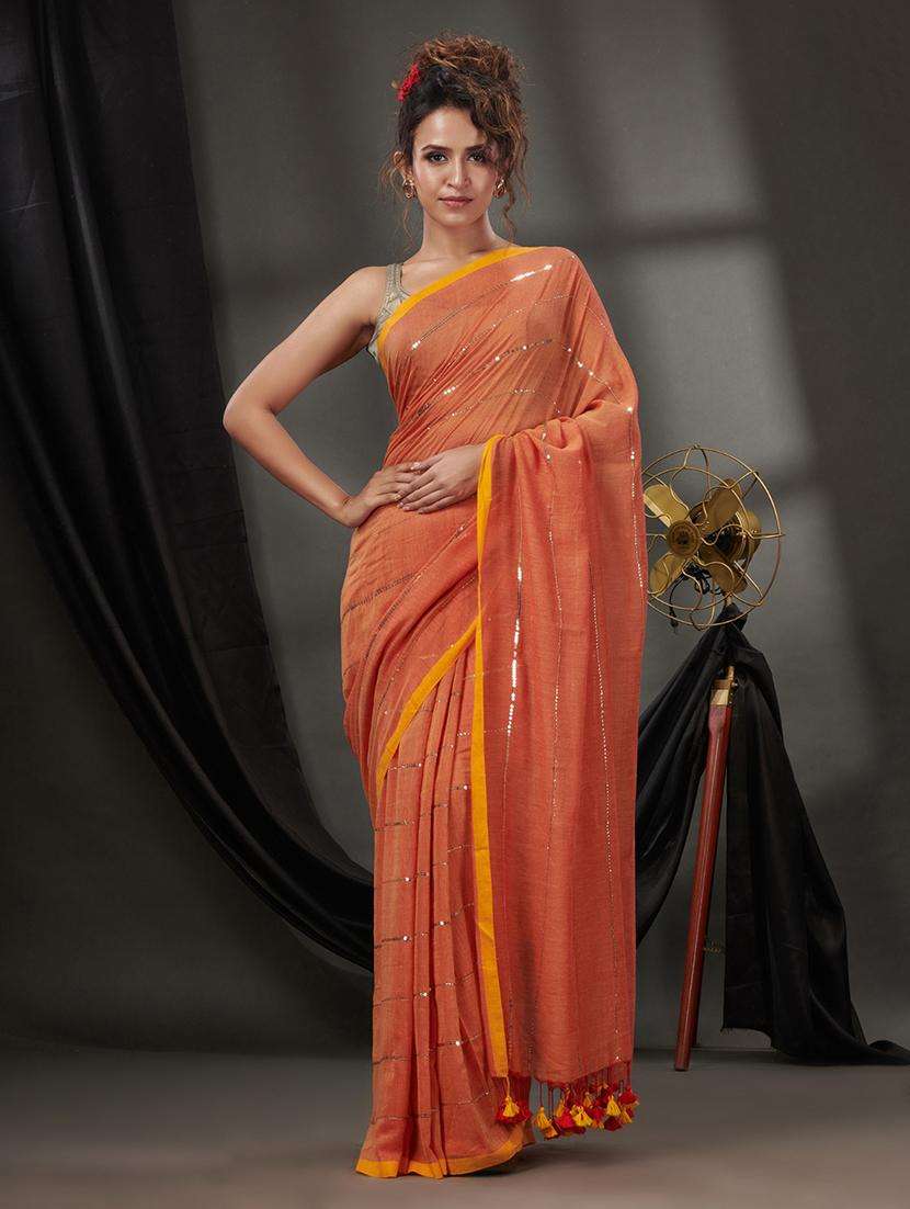 women solid with work embellished saree