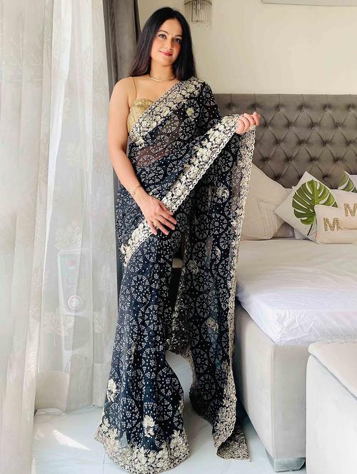 women bandhani printed bordered saree with blouse - 22047909 - Standard Image - 0