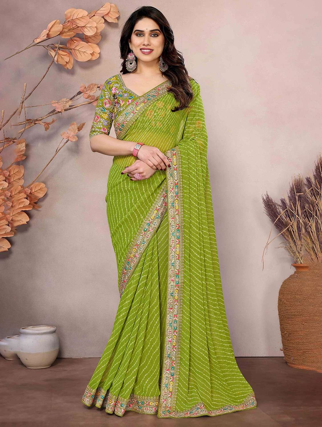 women leheriya printed bordered saree with blouse