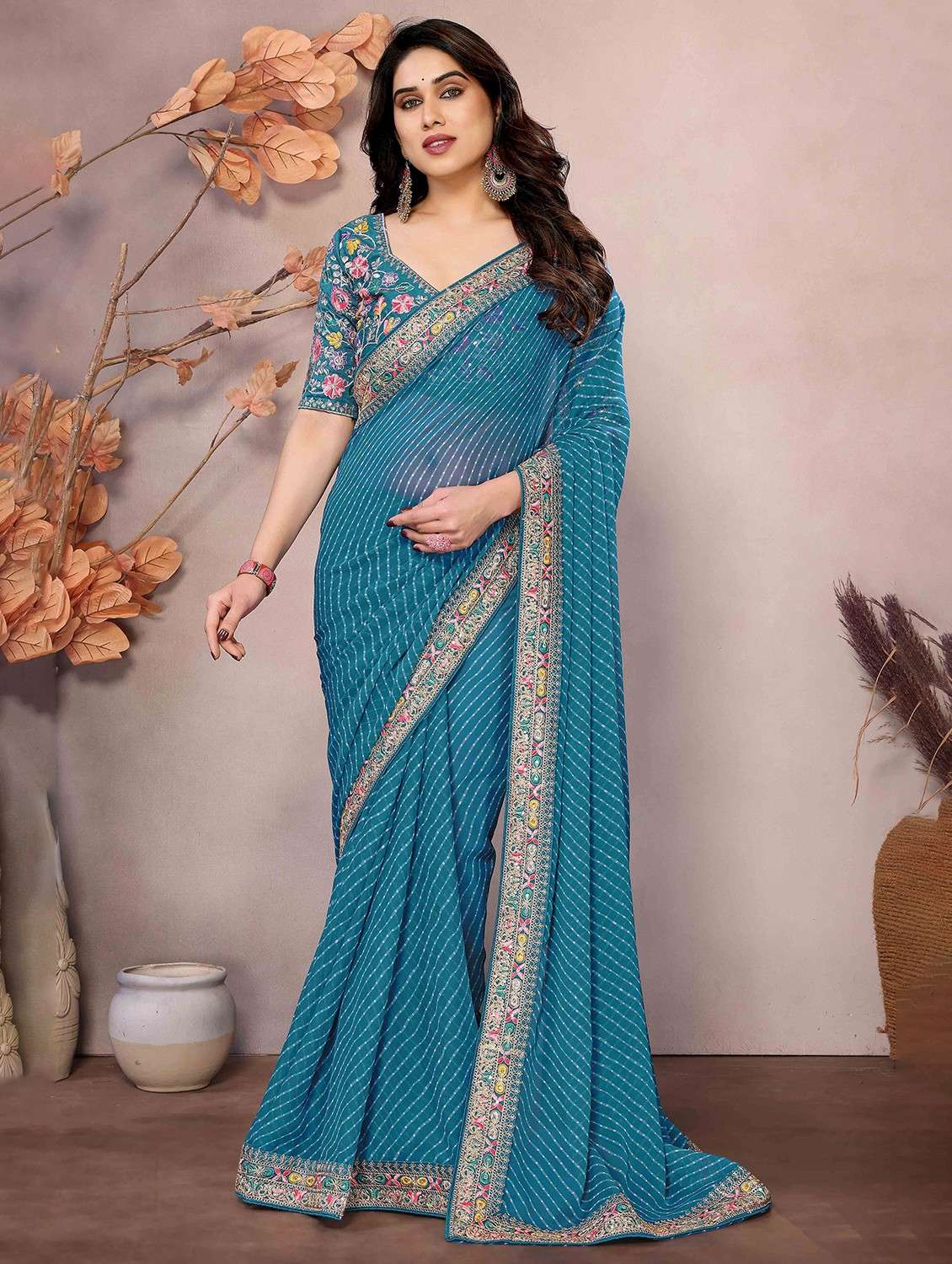 women leheriya printed bordered saree with blouse