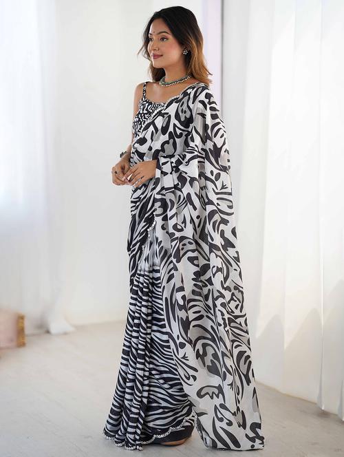 women printed casual wear saree with blouse - 22047985 -  Standard Image - 0