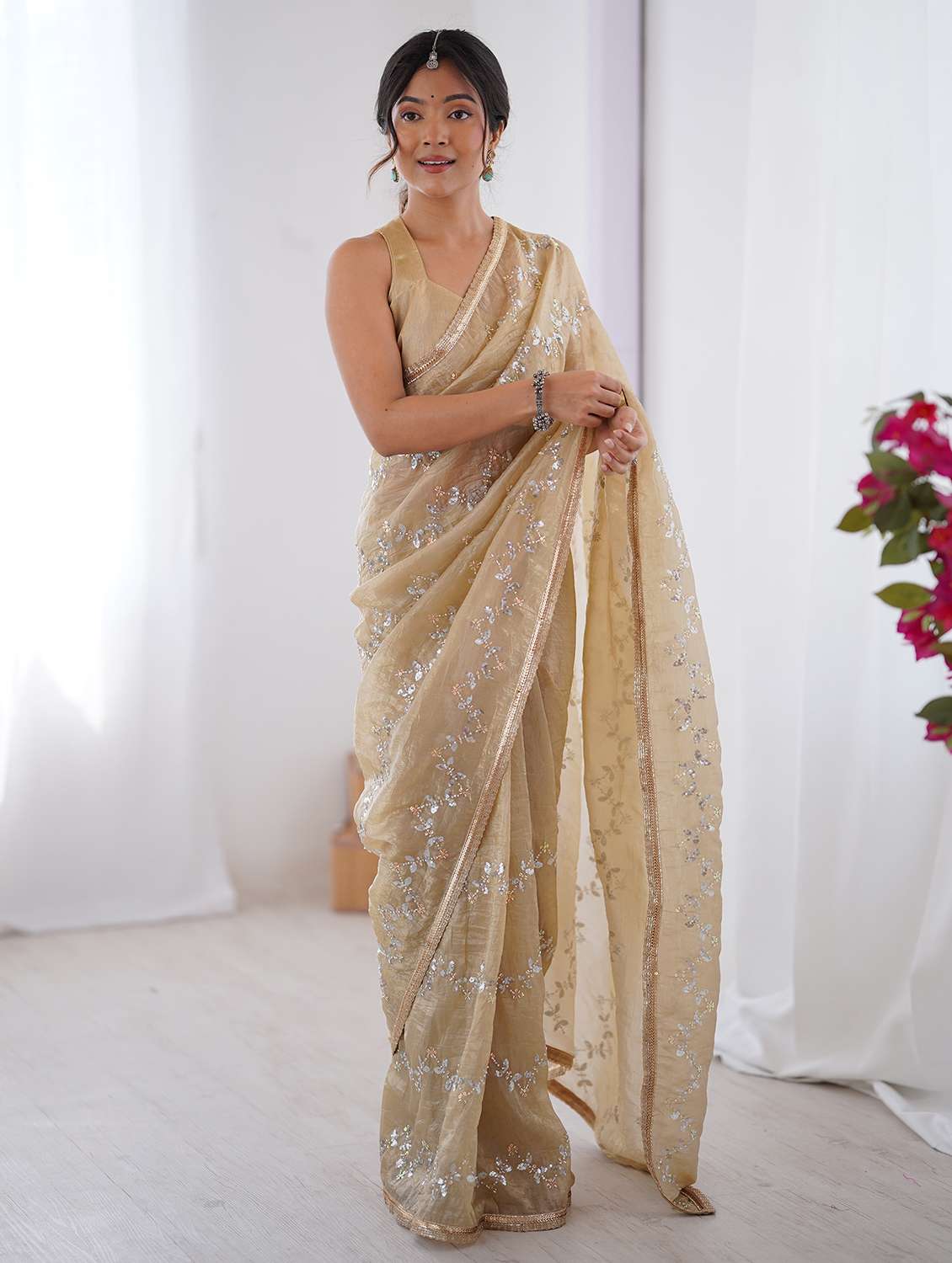 women beige embellished saree with blouse