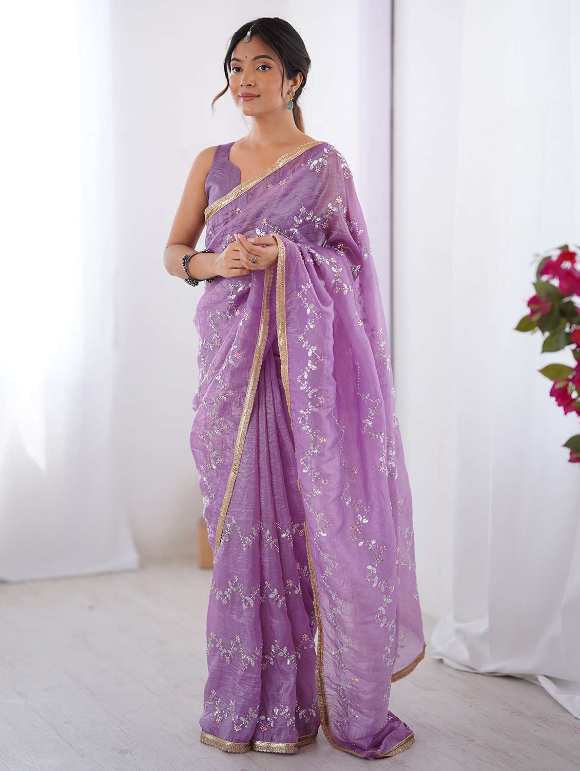 women lavender embellished saree with blouse