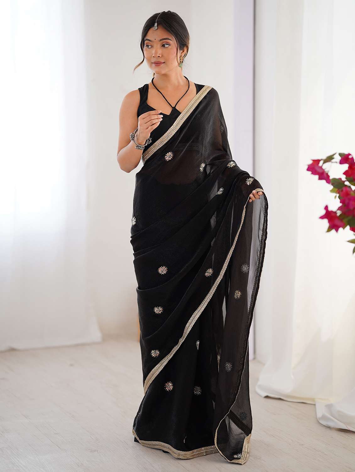 women solid with work embellished saree with blouse