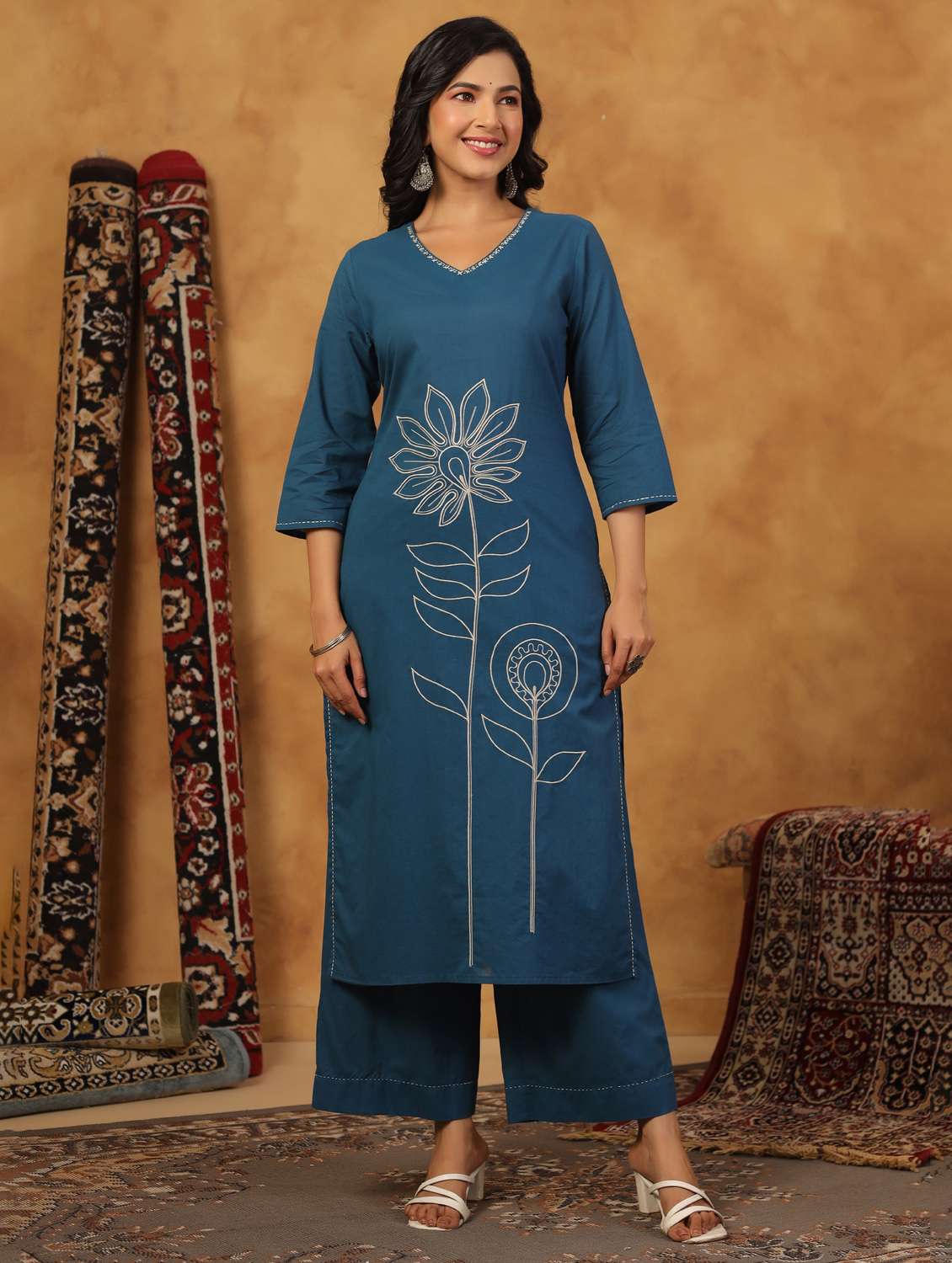 women embroidered three quarter sleeve kurta palazzo set