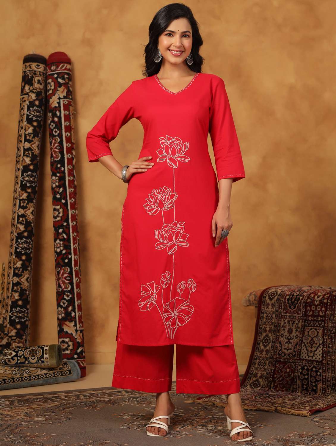 women embroidered three quarter sleeve kurta palazzo set