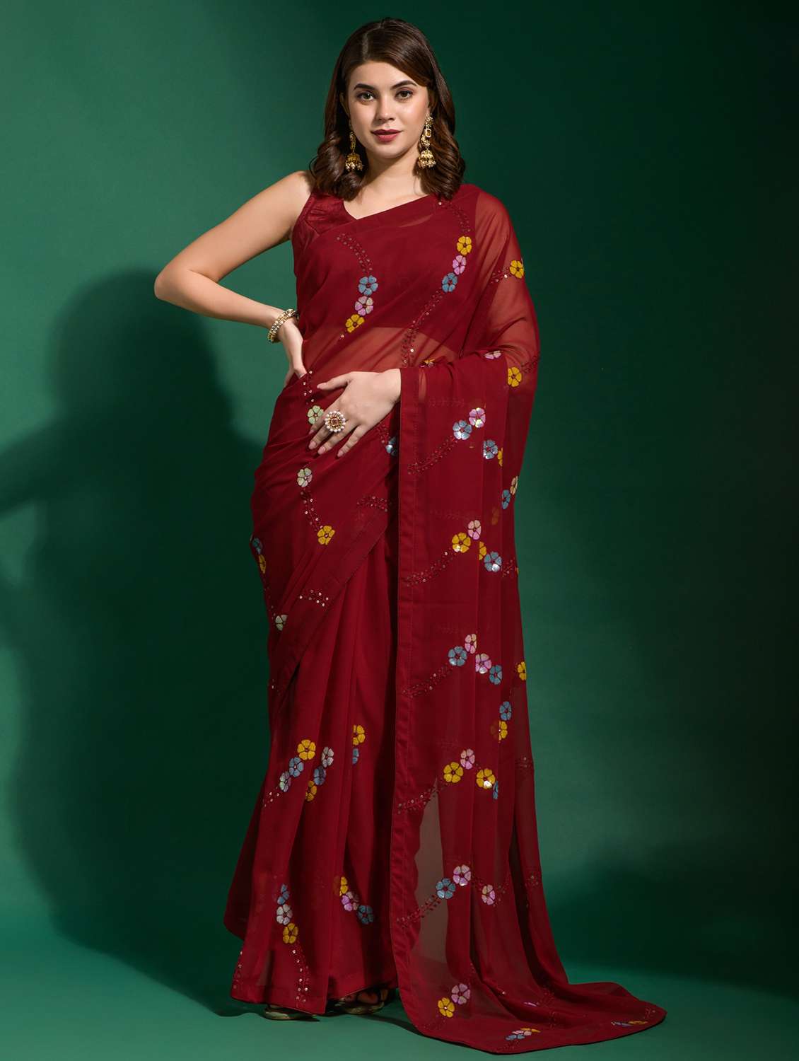women solid with work embroidered saree with blouse