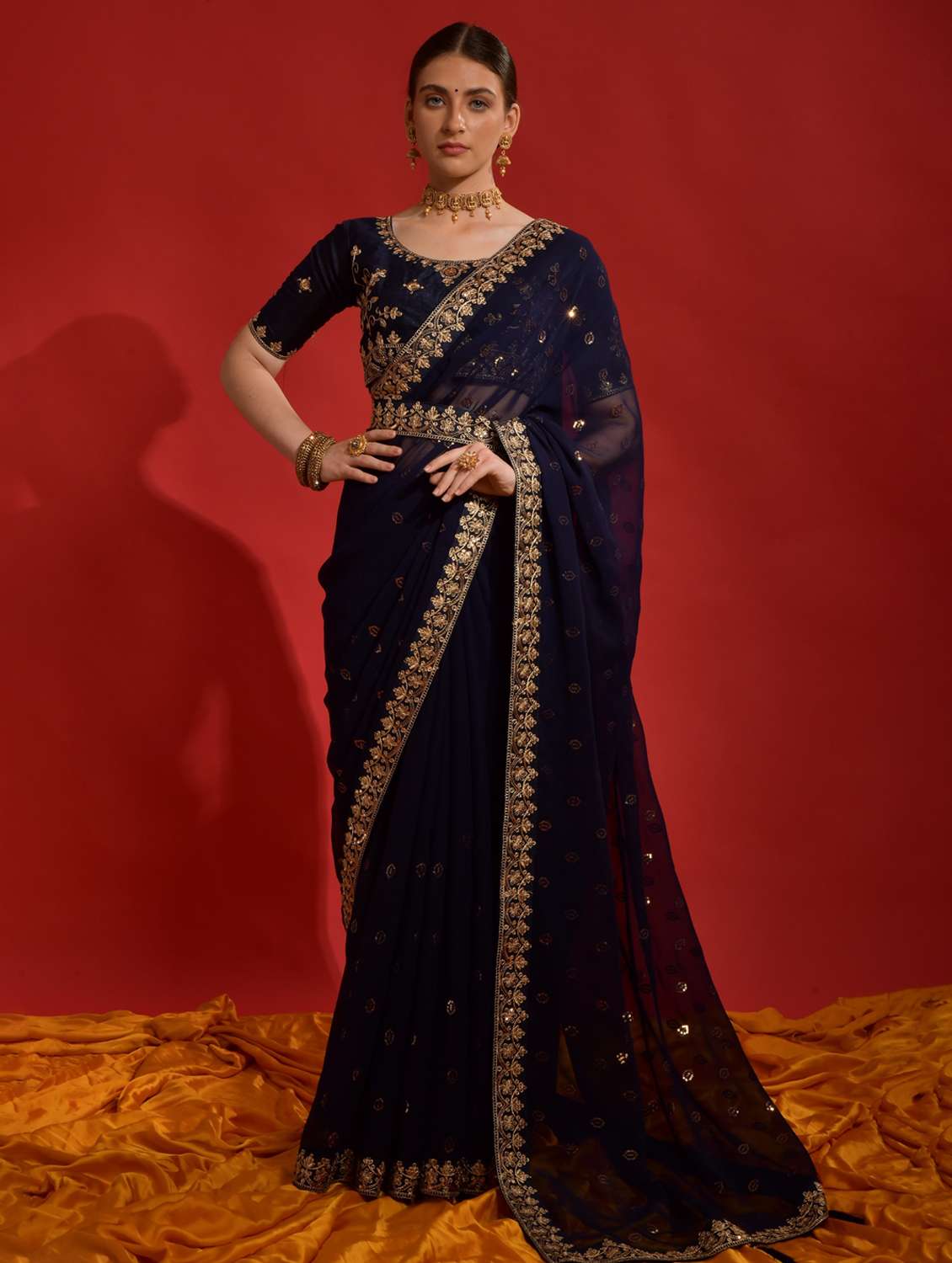 women solid with work embellished saree with blouse