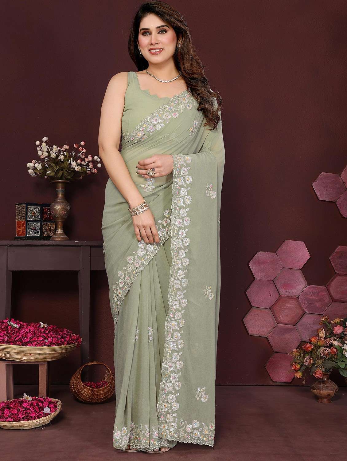 women solid with work embroidered saree with blouse