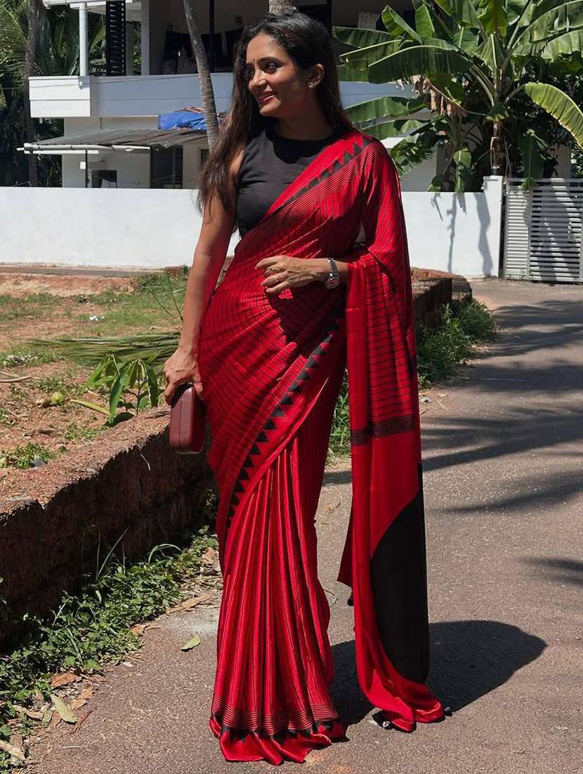 women striped printed saree with blouse