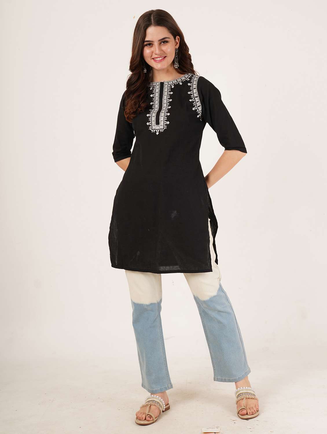 women embroidered three quarter sleeve straight kurti