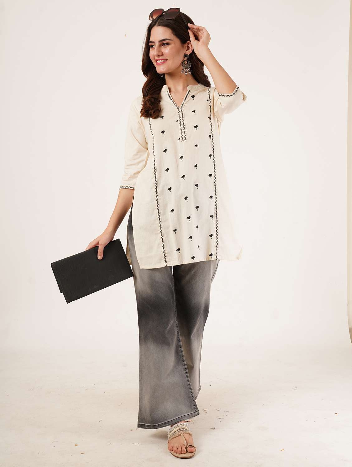 women embroidered three quarter sleeve straight kurti
