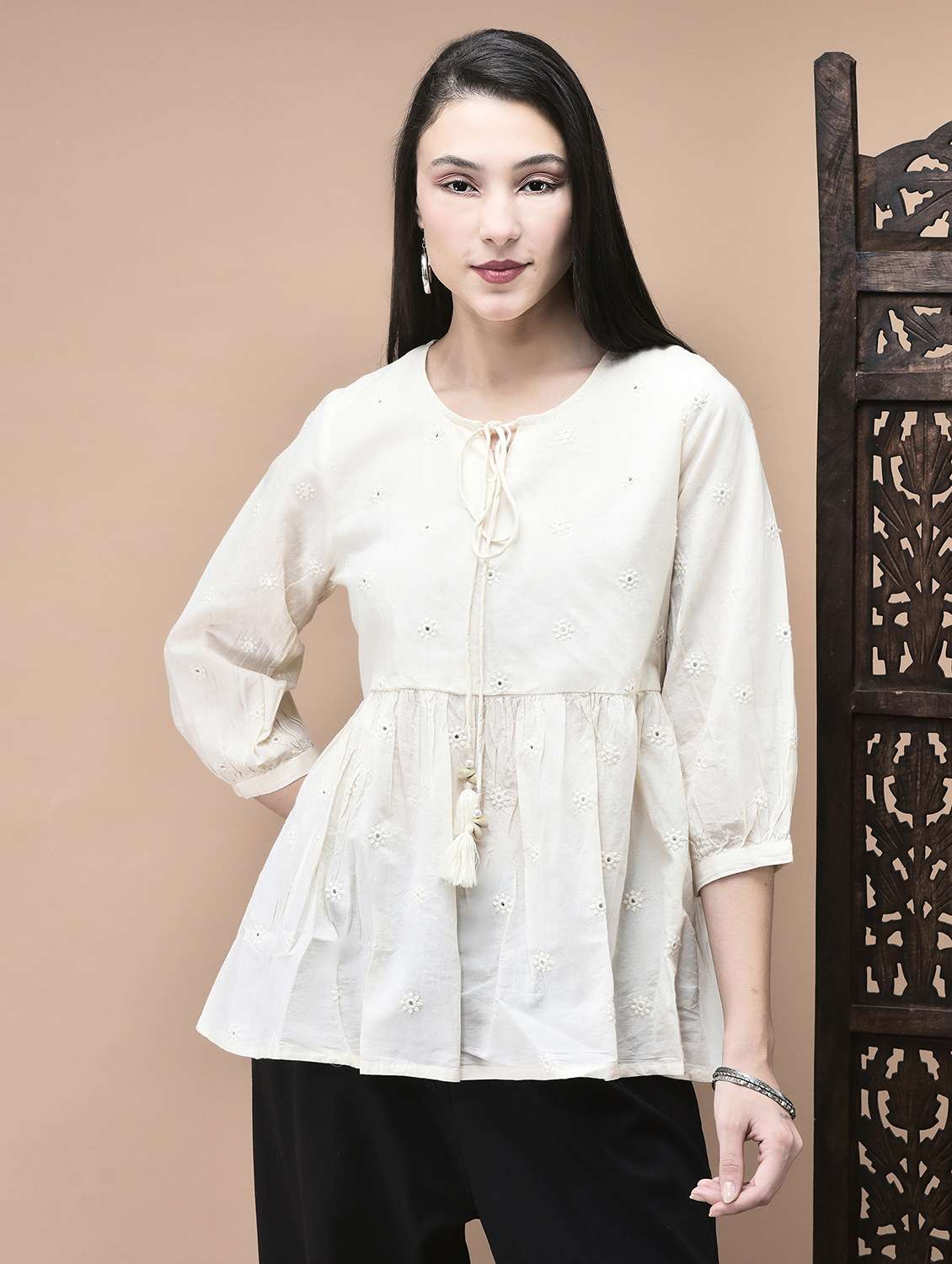 women embroidered tie-up neck flared tunic