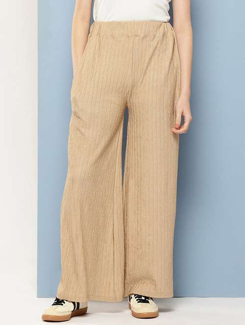 women solid mid rise flared palazzo - 22074043 - Standard Image - 0