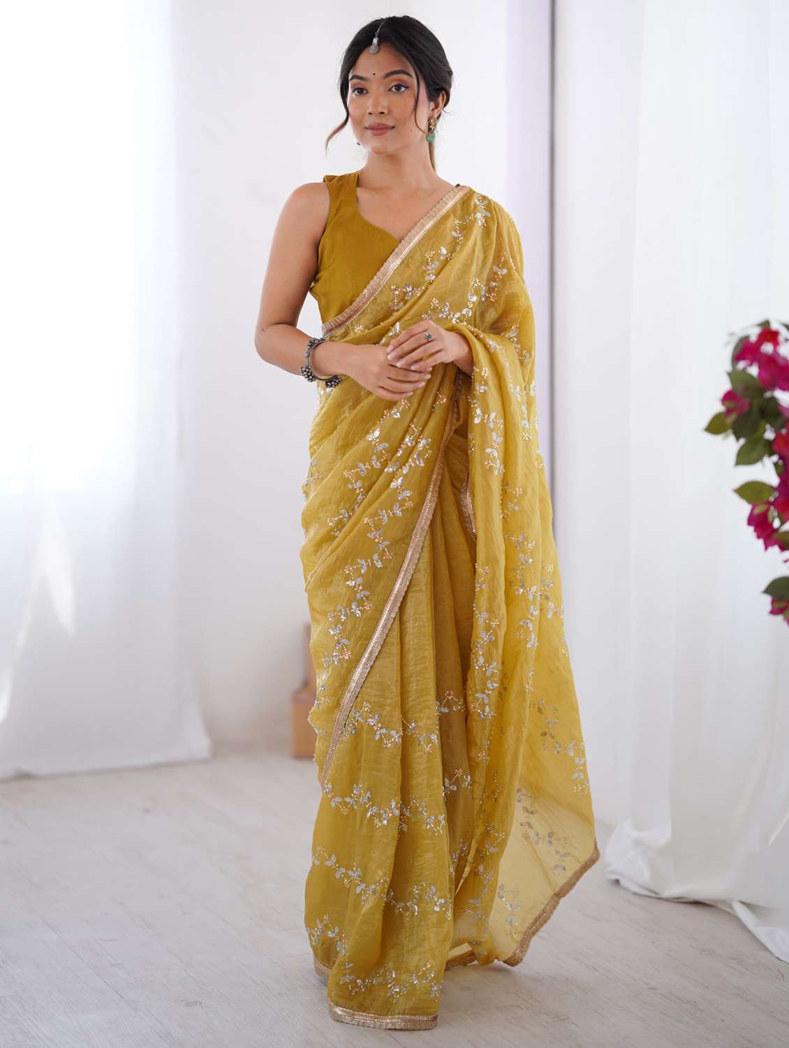 women solid with work embroidered saree with blouse