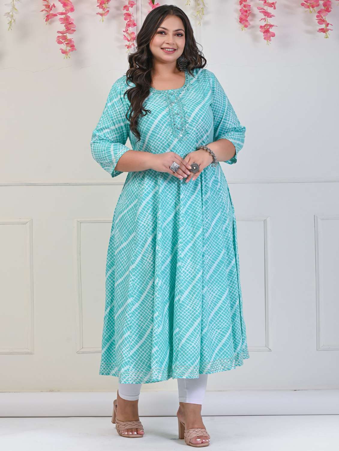 women printed three quarter sleeve a-line kurta