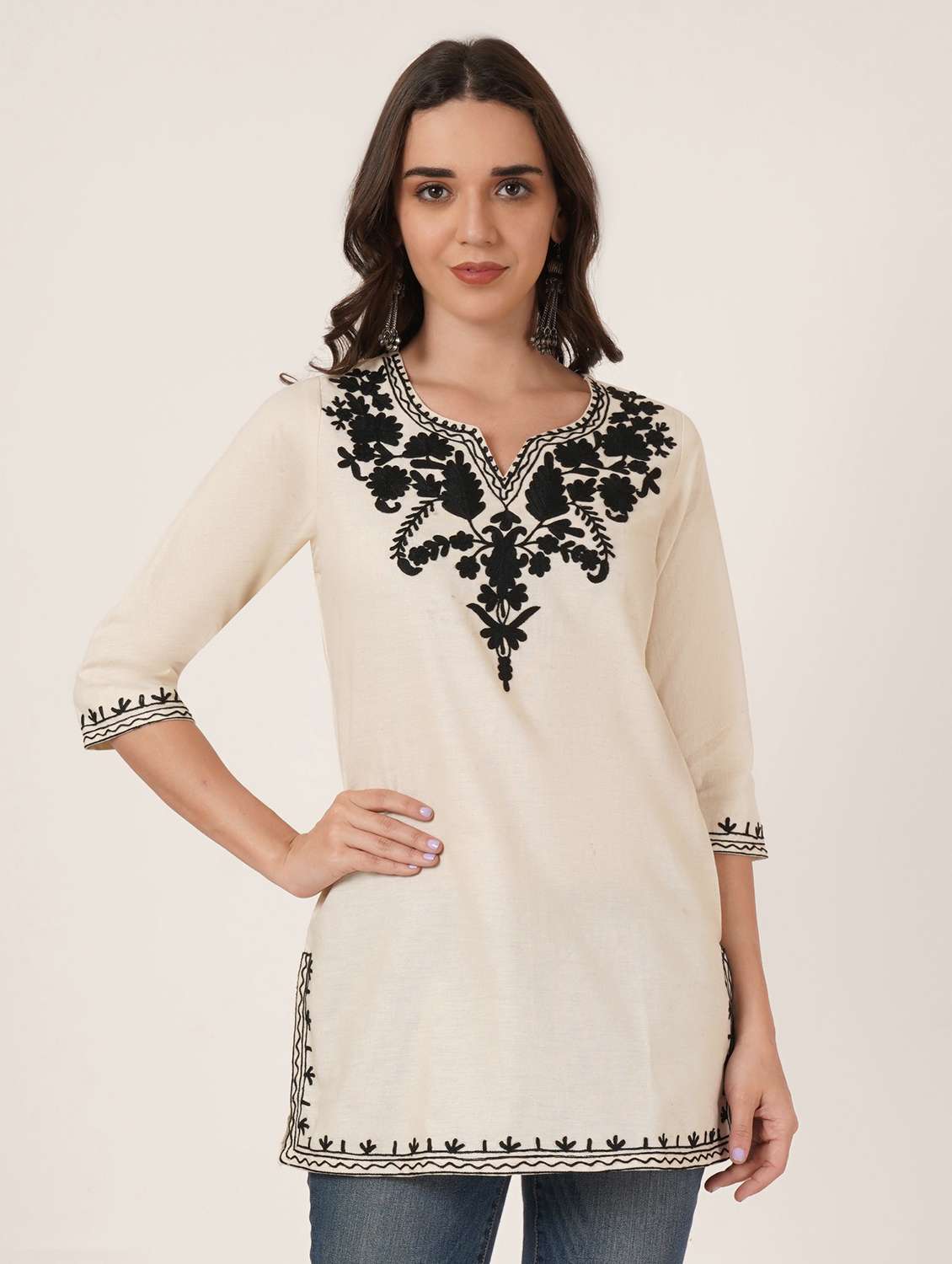 women embroidered three quarter sleeve kurti