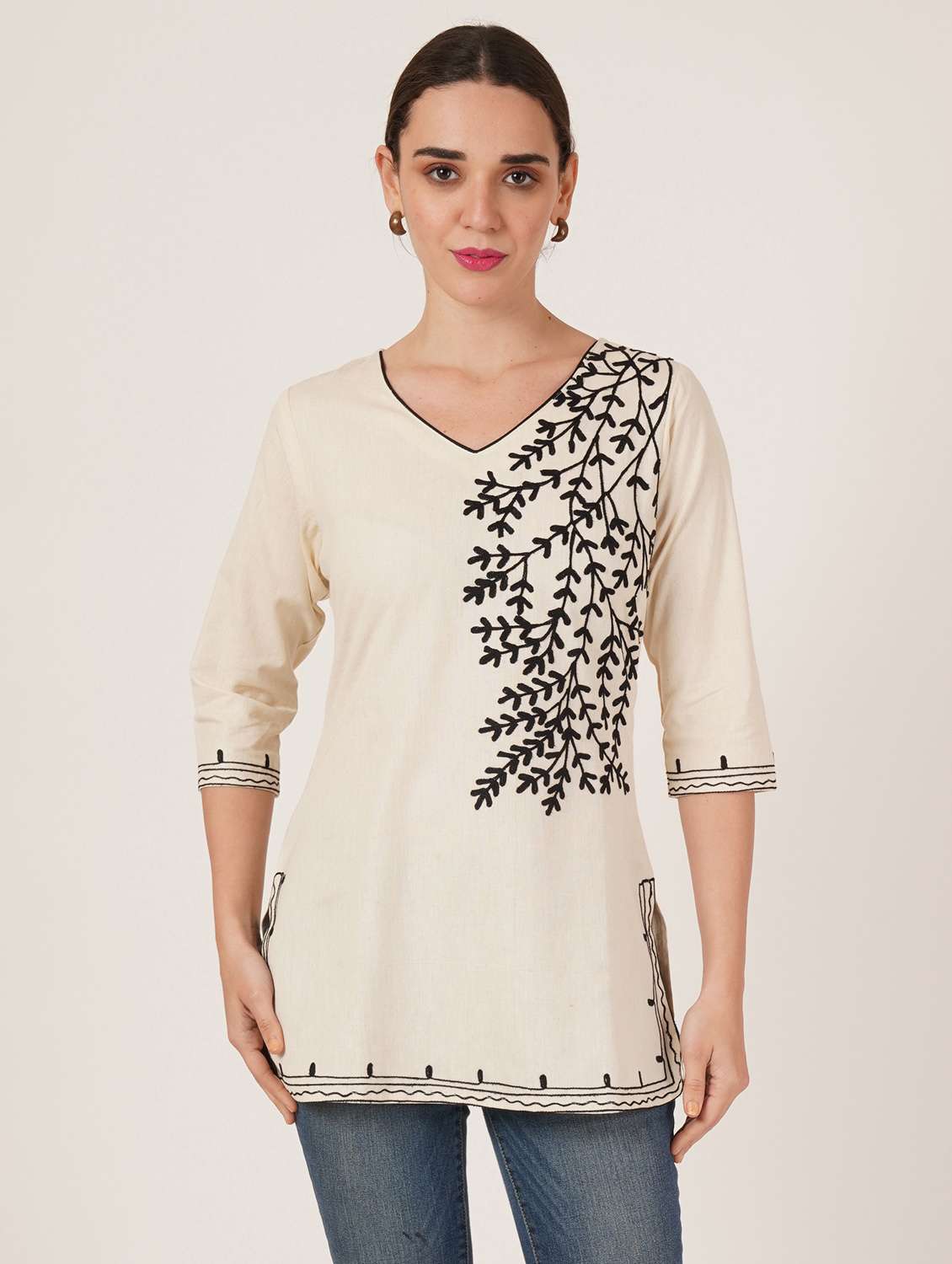women embroidered three quarter sleeve kurti