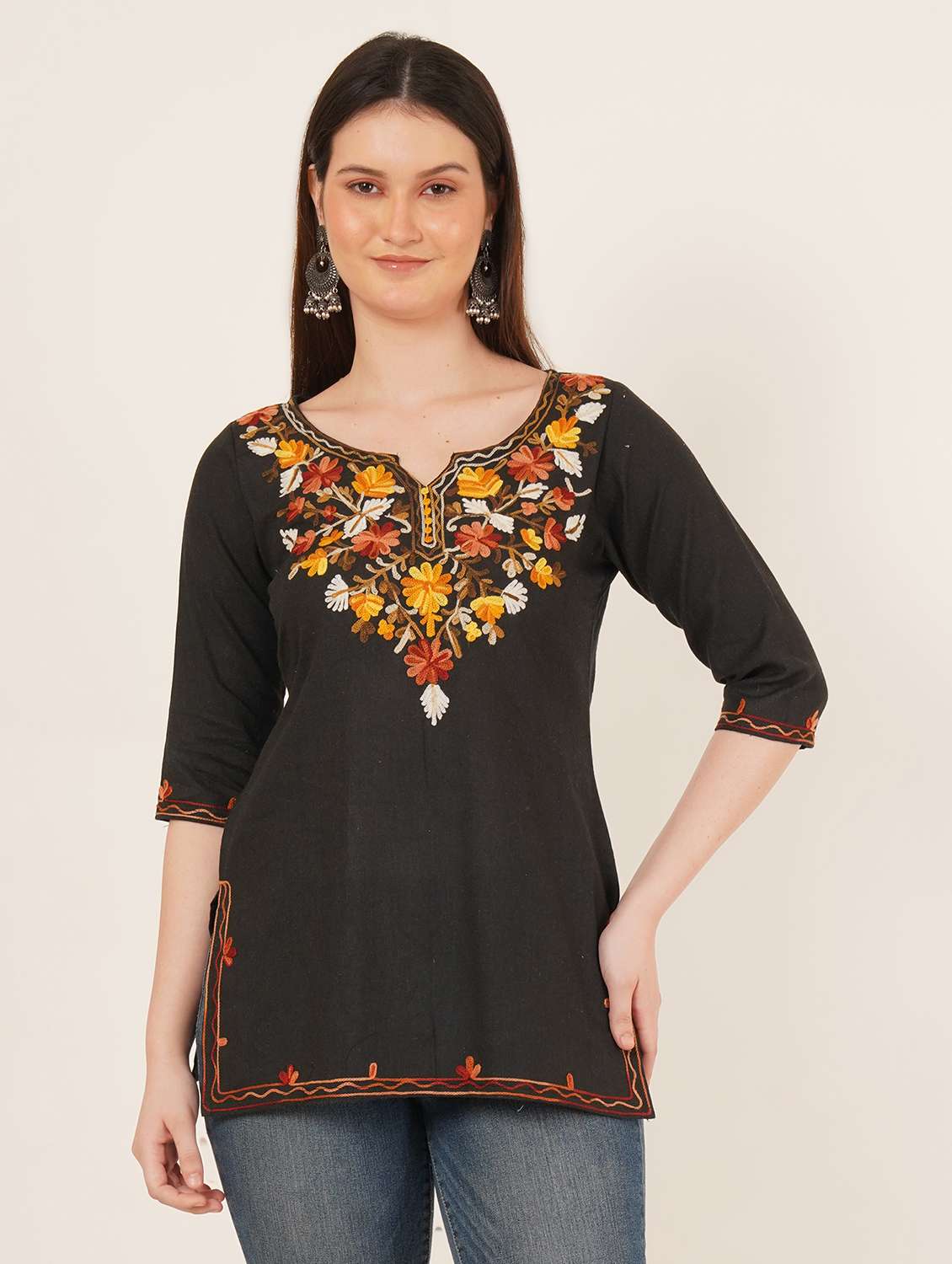 women embroidered three quarter sleeve kurti