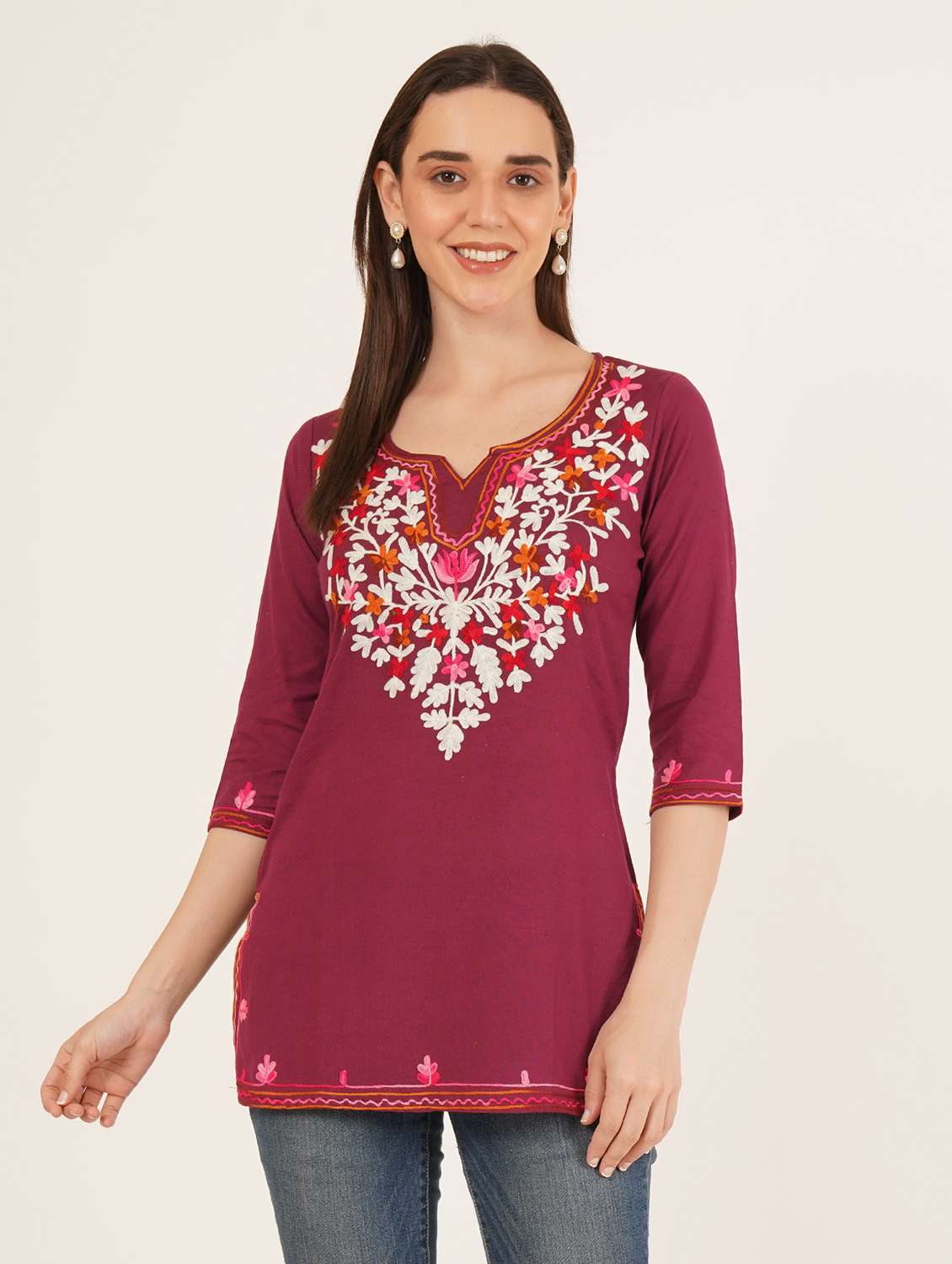 women embroidered three quarter sleeve kurti