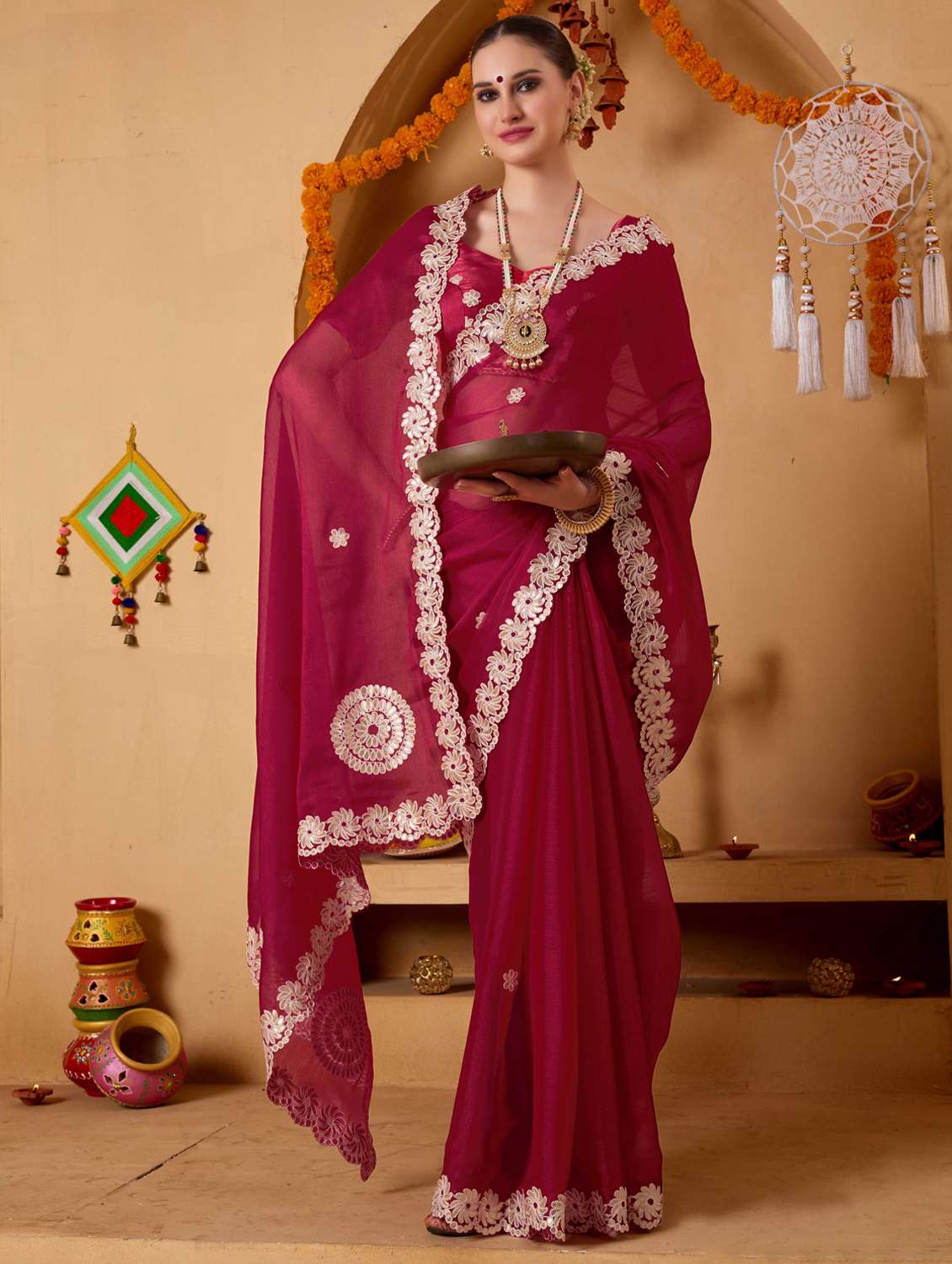 women solid with work embroidered saree with blouse