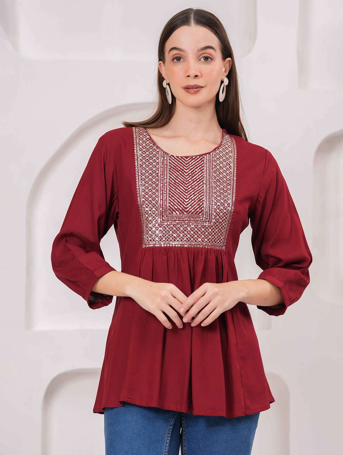 women embroidered three quarter sleeve kurti