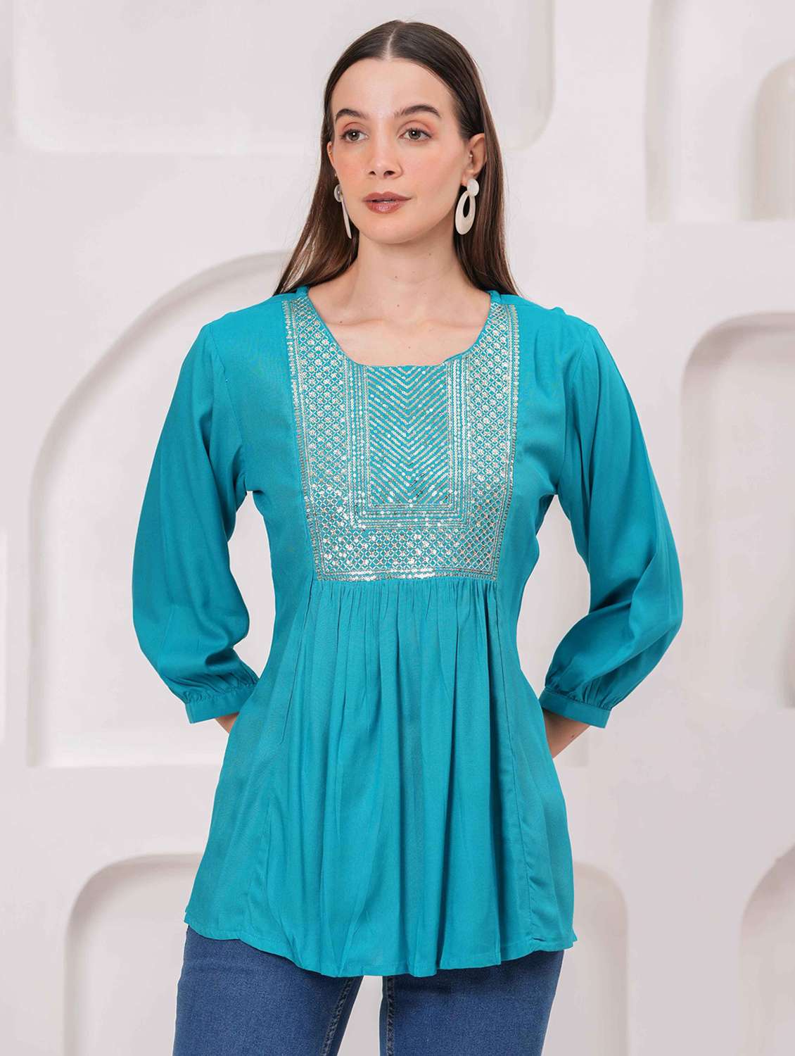 women embroidered three quarter sleeve kurti