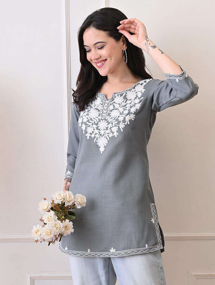 women embroidered three quarter sleeve straight kurti