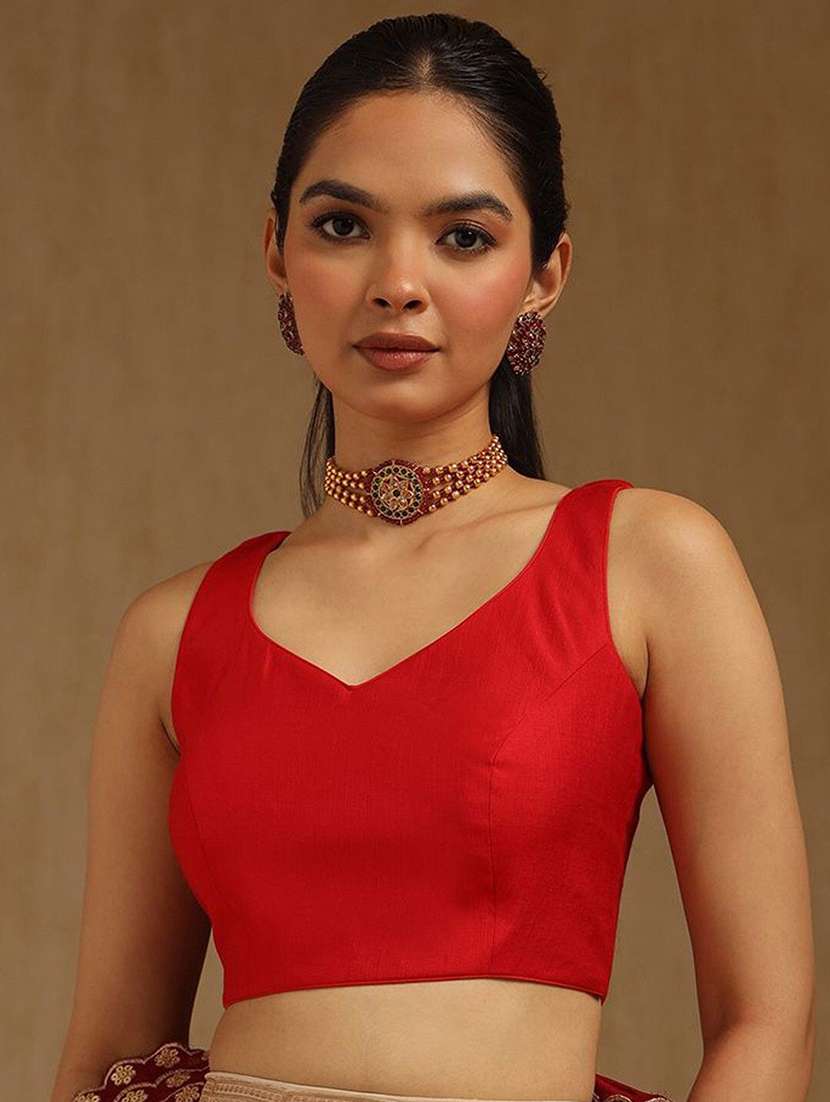 women solid sleeveless stitched blouse