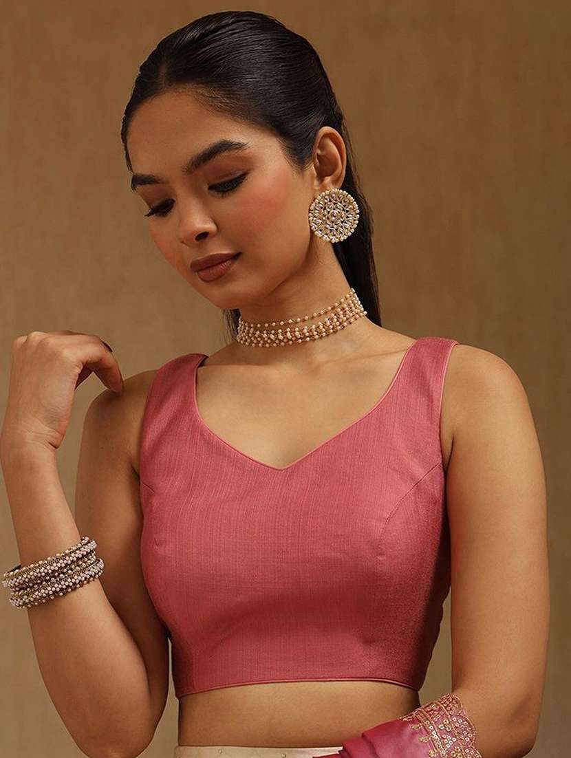 women solid sleeveless stitched blouse