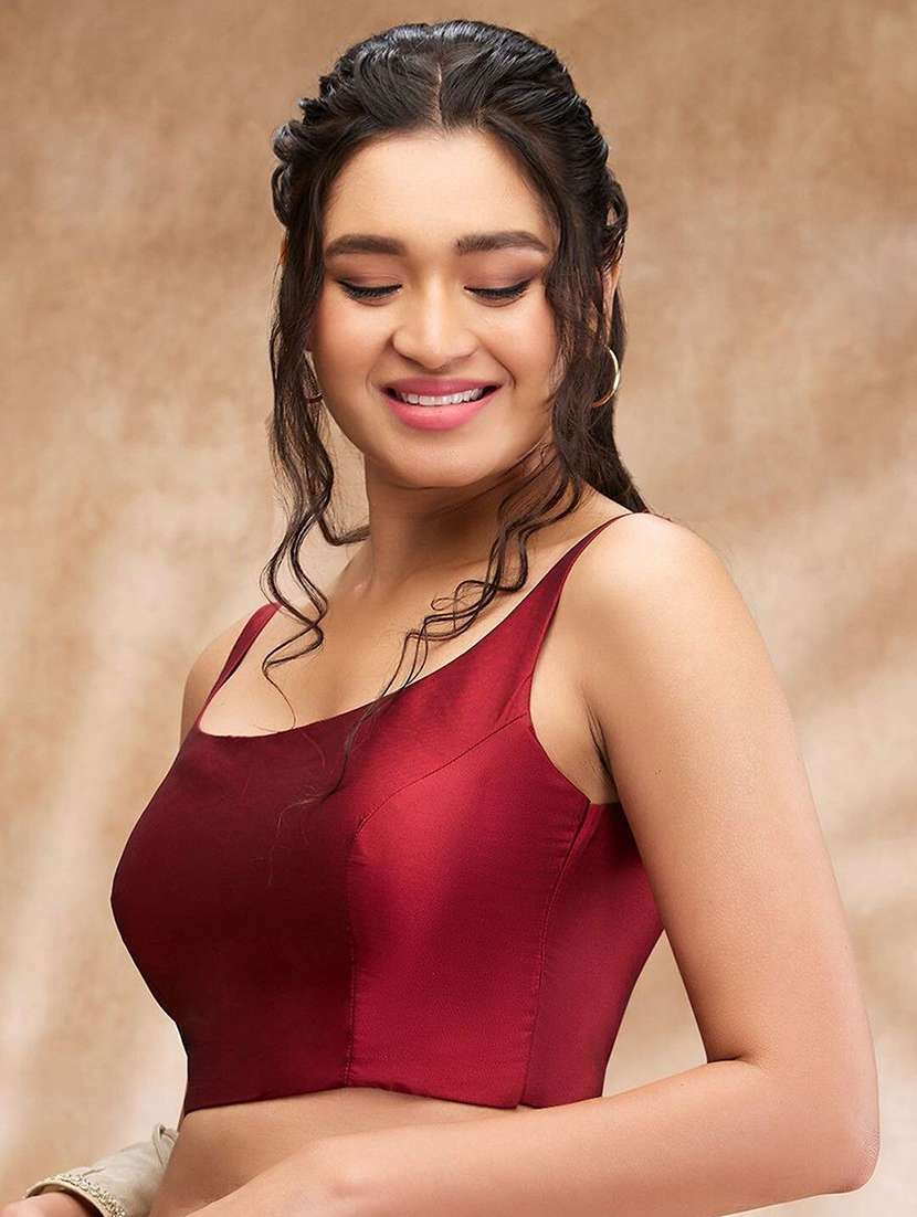 women solid sleeveless stitched blouse