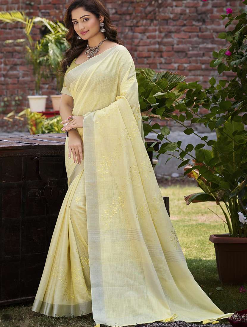 women solid with work embroidered saree with blouse