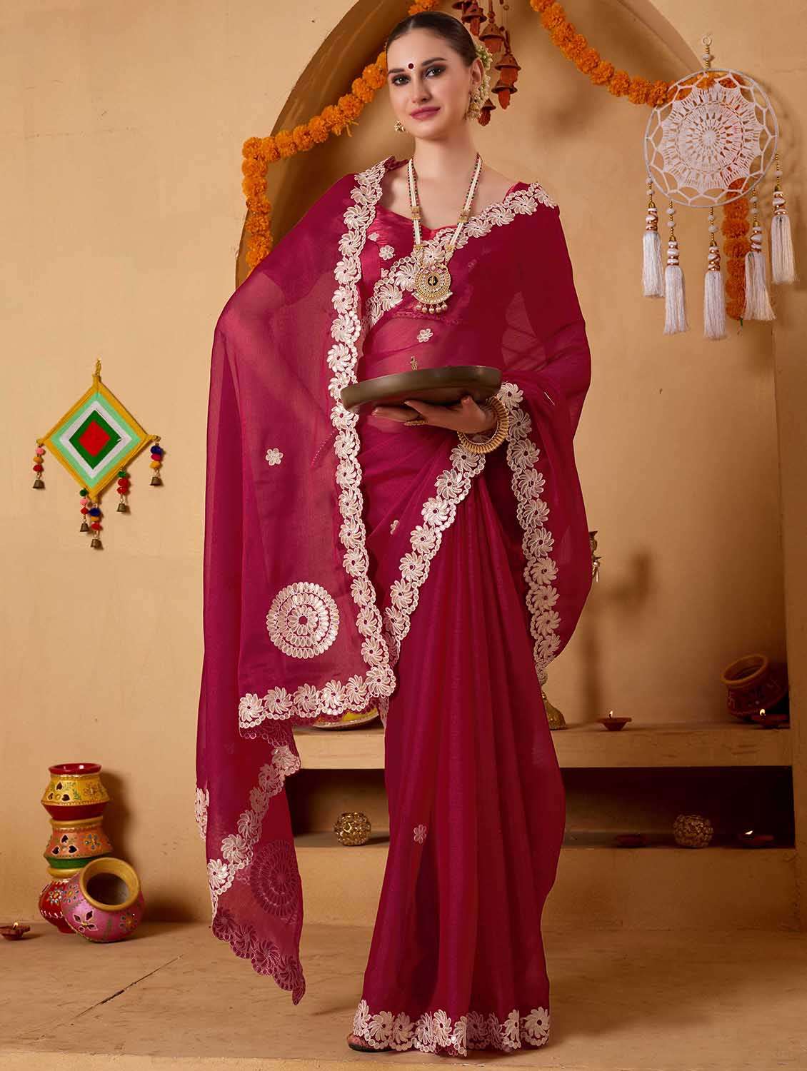 women solid with work embroidered saree with blouse
