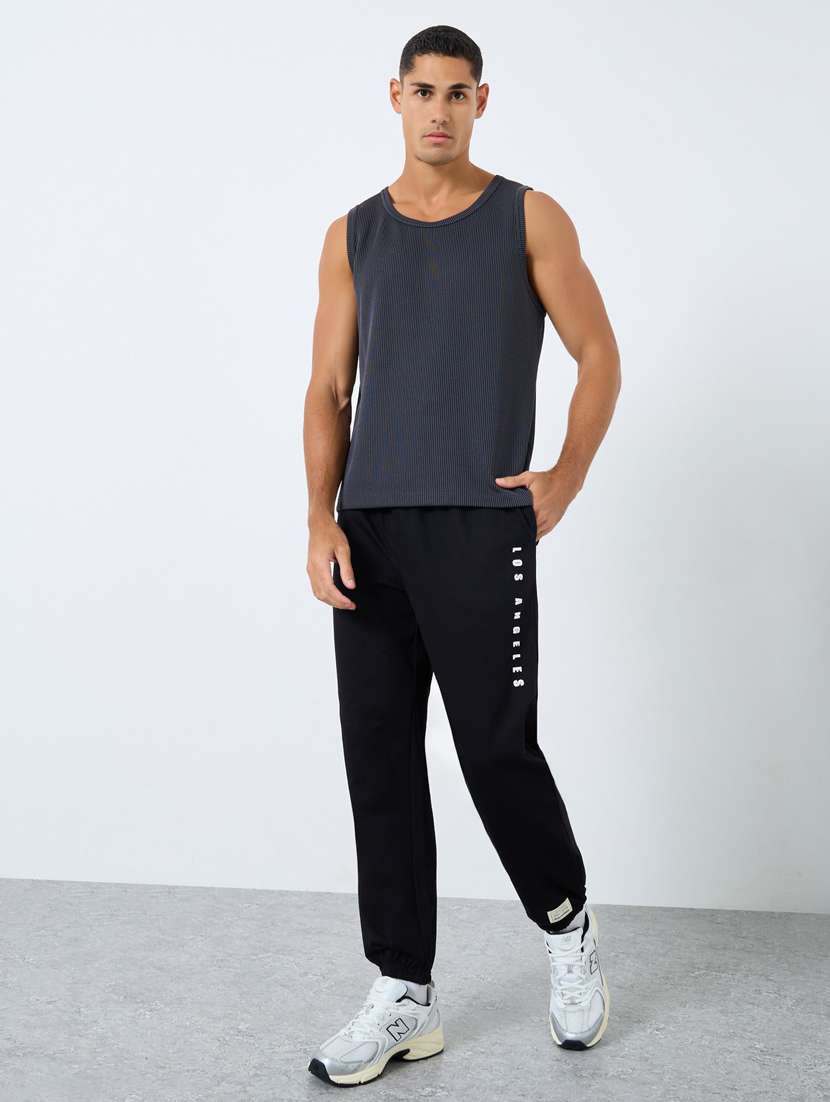 men typographic mid rise relaxed fit jogger - 22083315 -  Standard Image - 2
