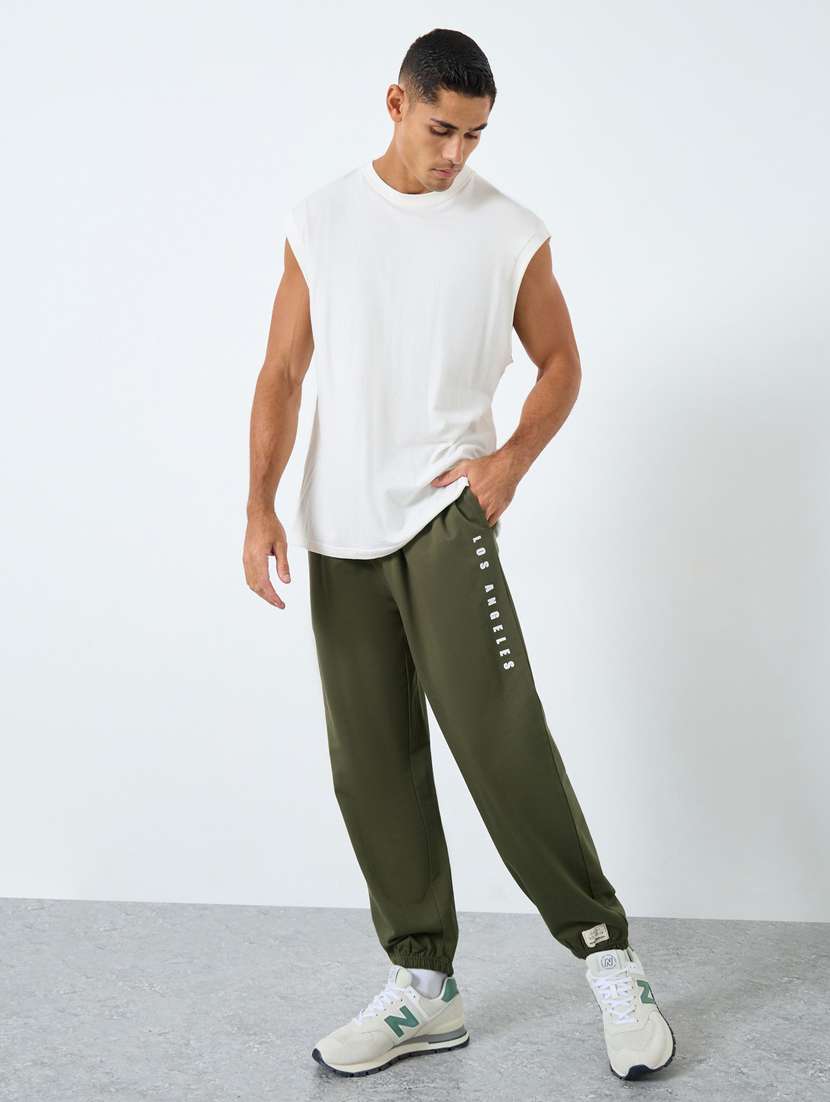 men typographic mid rise relaxed fit jogger - 22083316 -  Standard Image - 2