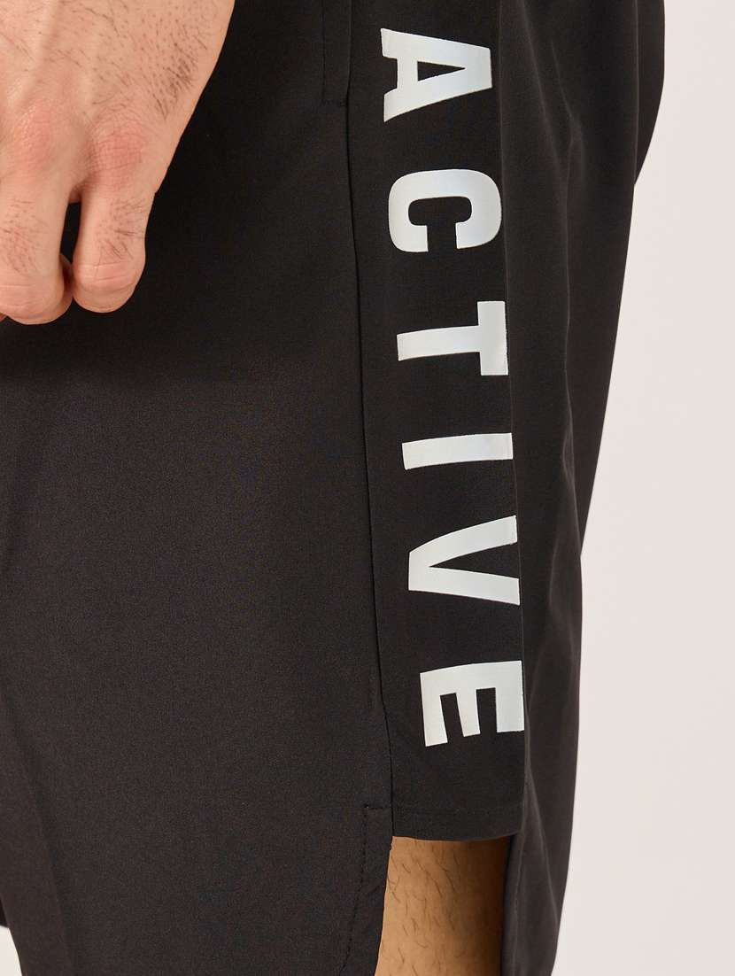 men typographic mid rise regular fit sports shorts - 22083330 - Standard Image - 2