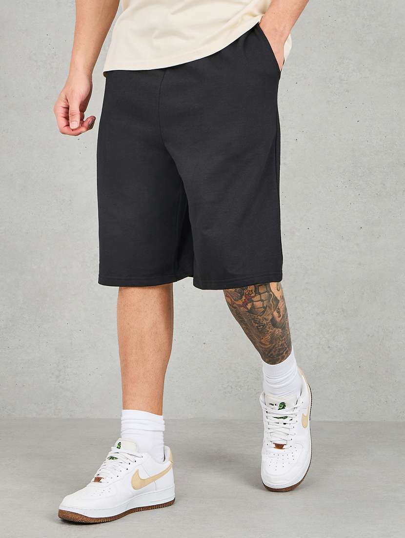 men solid mid rise three - fourth shorts - 22083332 - Zoom Image - 0