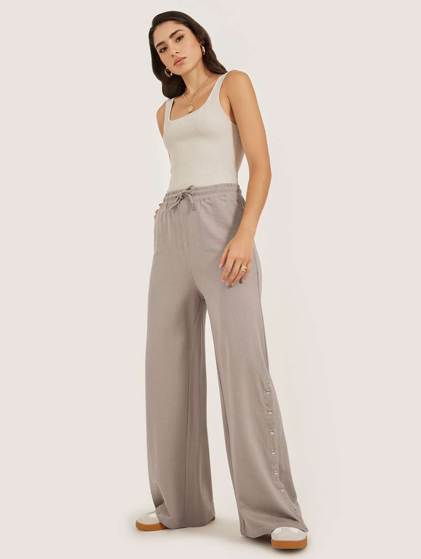 women solid mid rise relaxed fit track pant - 22083455 -  Standard Image - 2
